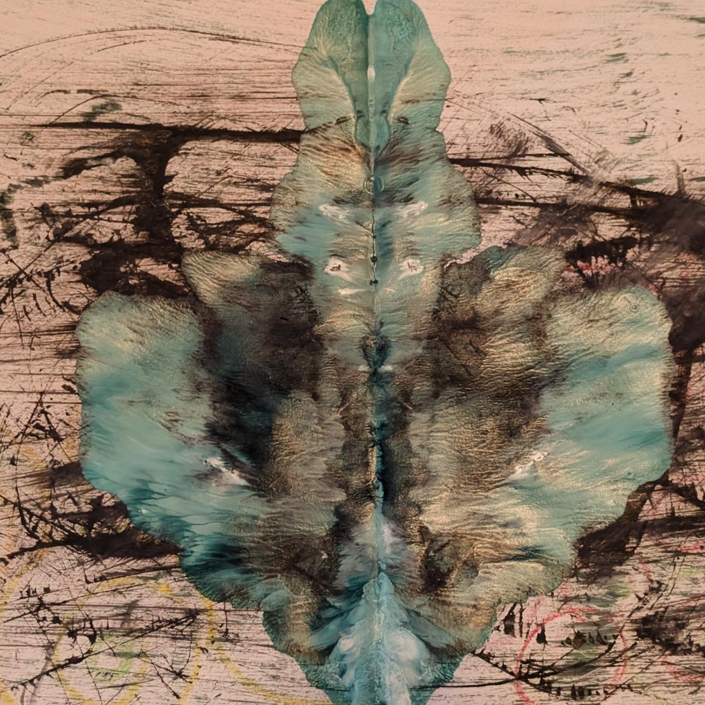 Mirrored teal abstract print with black expressive marks on a blush background